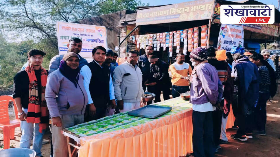 Volunteers distribute food on Makar Sankranti in Singhana