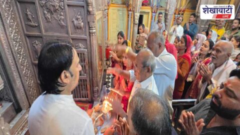 Devotees crowd and priests performing rituals at Sakray Dham temple