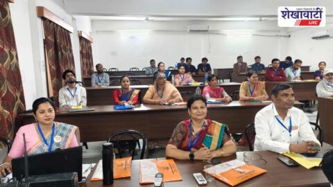 JJT University faculty development program session participants academic discussion