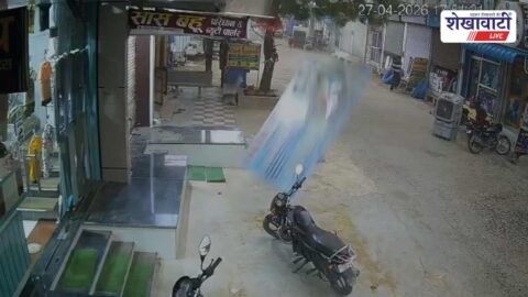 Fallen hoarding damages bike after storm in Chirawa market area