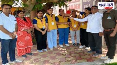 Students placing bird water pots at VPL Career Institute Jhunjhunu