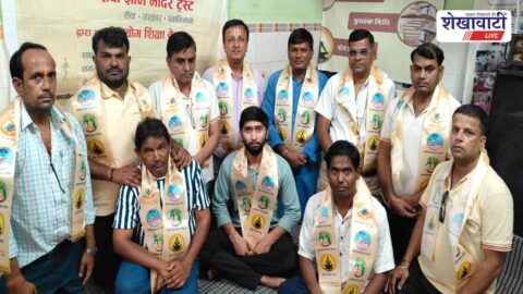 Trust members discussing social campaigns during Jhunjhunu meeting