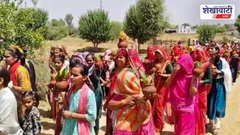 Women carrying holy kalash during Ram Katha procession