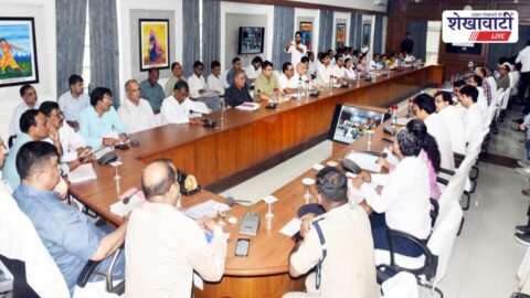 Sanjay Sharma reviewing flagship schemes in Sikar collectorate meeting