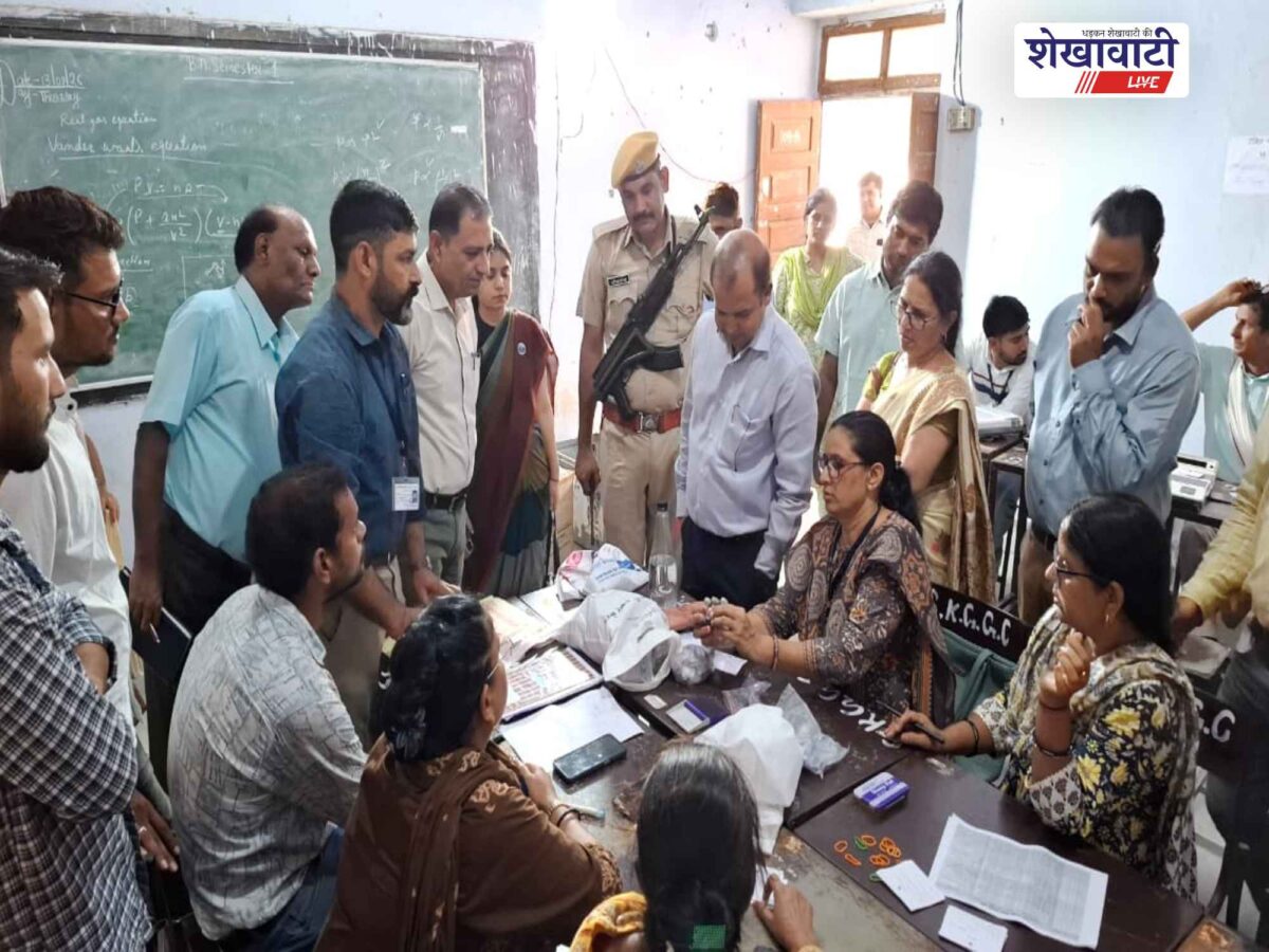 sikar-collector-ashish-modi-inspects-evm-sealing-process