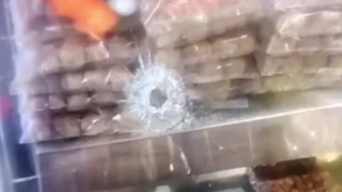 फिरौती का फायर : चिड़ावा के मशहूर पेड़ा व्यवसायी की दूकान पर फायरिंग