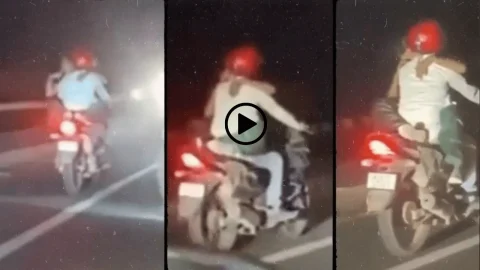 Viral Video : अजमेर हाईवे पर चलती बाइक पर कपल ने किया जबरदस्त रोमांस! देखें वायरल वीडियो